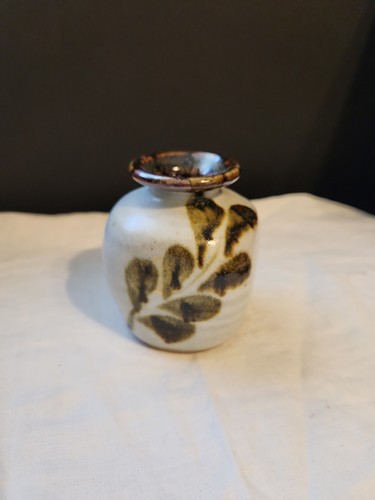 Hand made pottery small - hand,